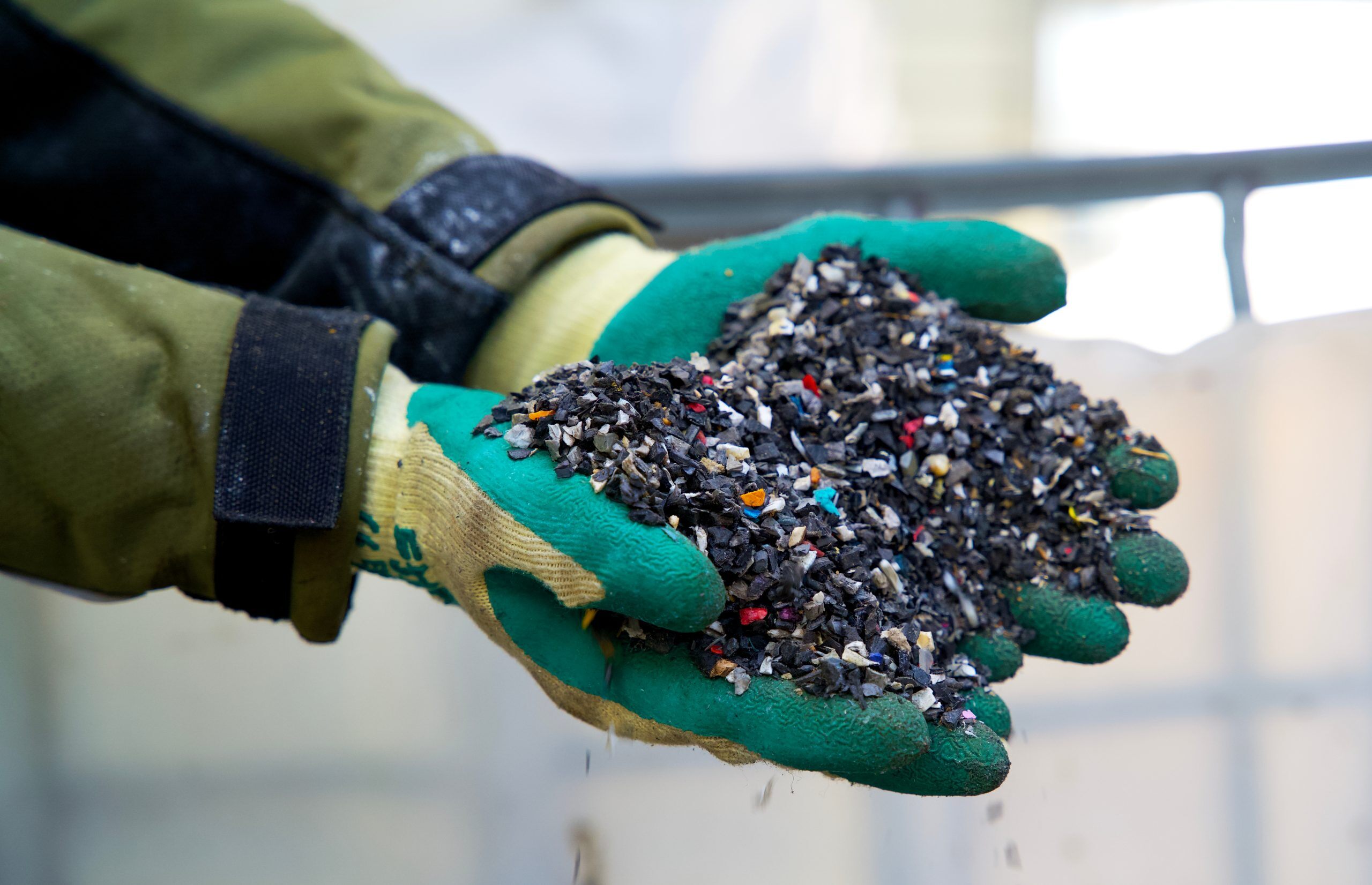 Close up of granulated plastic waste on a recycling plant for pl